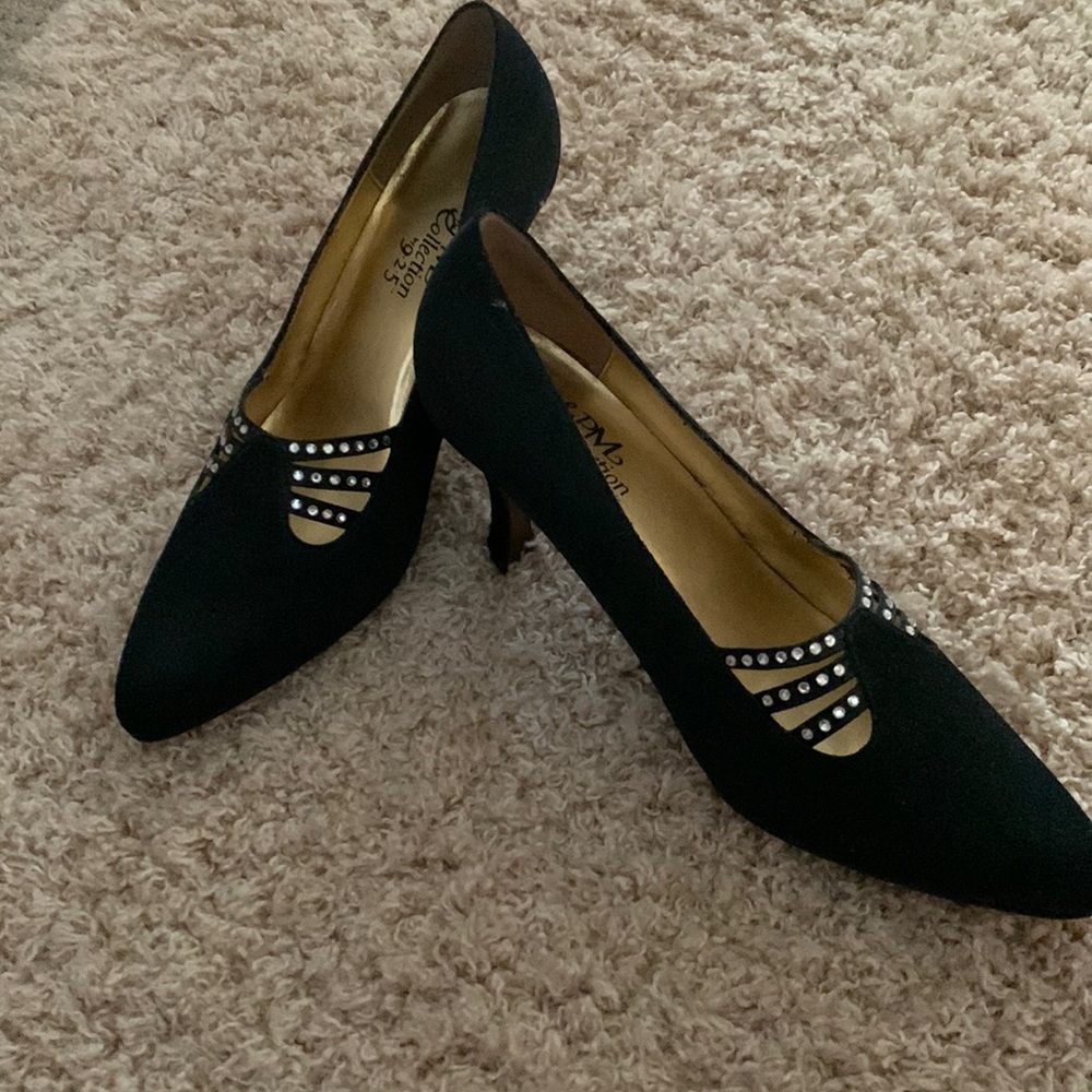 Worn once to wedding, size 8 1/2. Black
